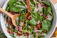 Savory Spinach & Pea Salad with Crispy Bacon and Sausage