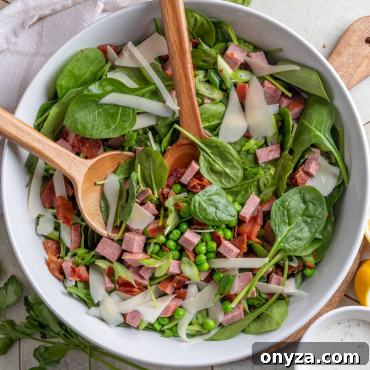 Savory Spinach & Pea Salad with Crispy Bacon and Sausage 1 featured 28773