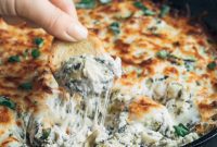 Decadent Six-Cheese Spinach Artichoke Dip