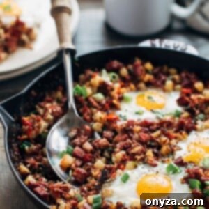 Hearty Corned Beef Hash and Eggs 6 corned beef hash and eggs in a cast iron skillet