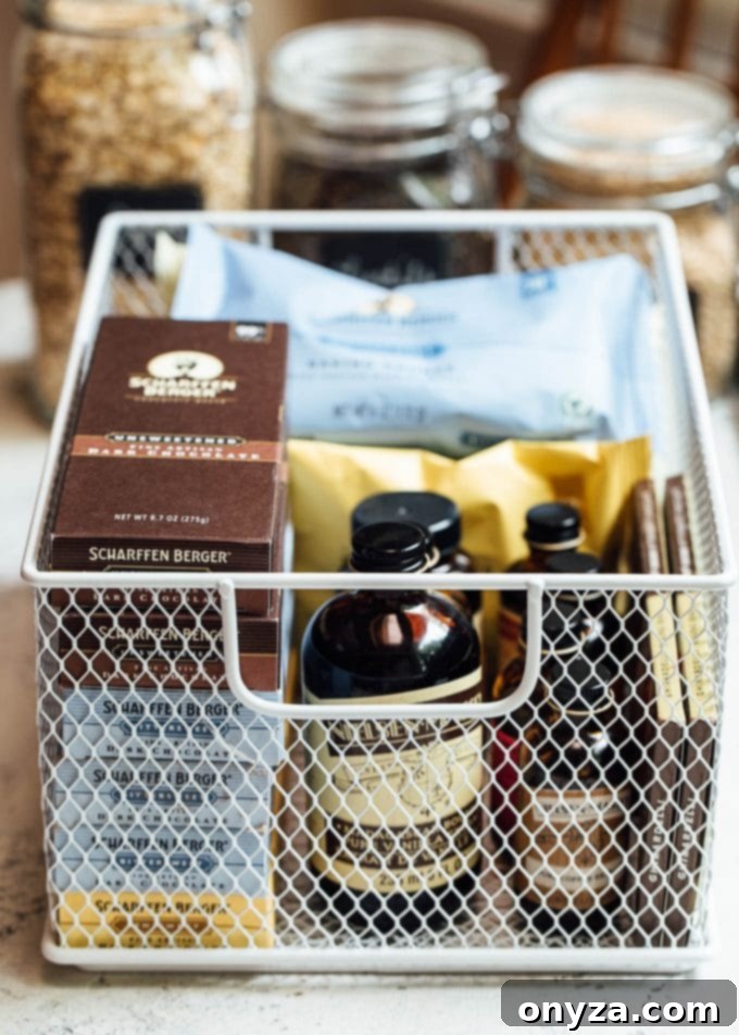 Stress-Free Pantry Organization You'll Love 5 wire baskets with baking supplies for pantry organization
