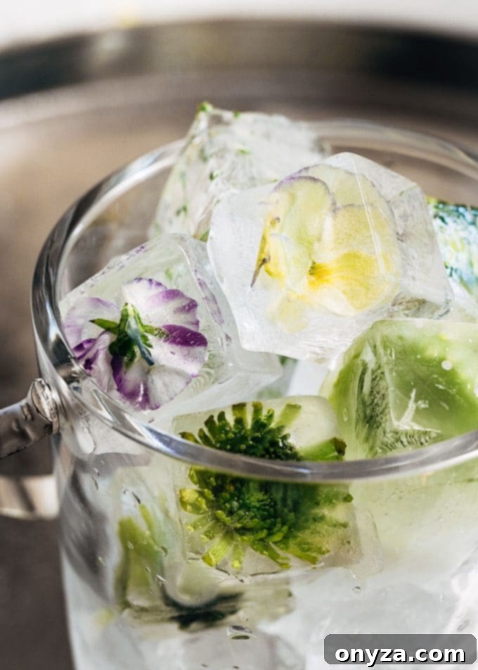 Crystal ice bucket filled with beautifully crafted flower ice cubes