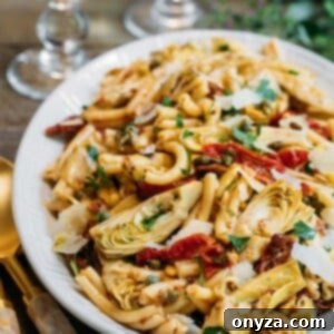 Sun-Dried Tomato and Artichoke Pasta Salad 2 sun-dried tomato pasta salad with artichoke hearts