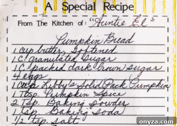 A cherished handwritten recipe card from Aunt Ellen for her famous pumpkin bread, showcasing the personal touch behind this beloved fall recipe.