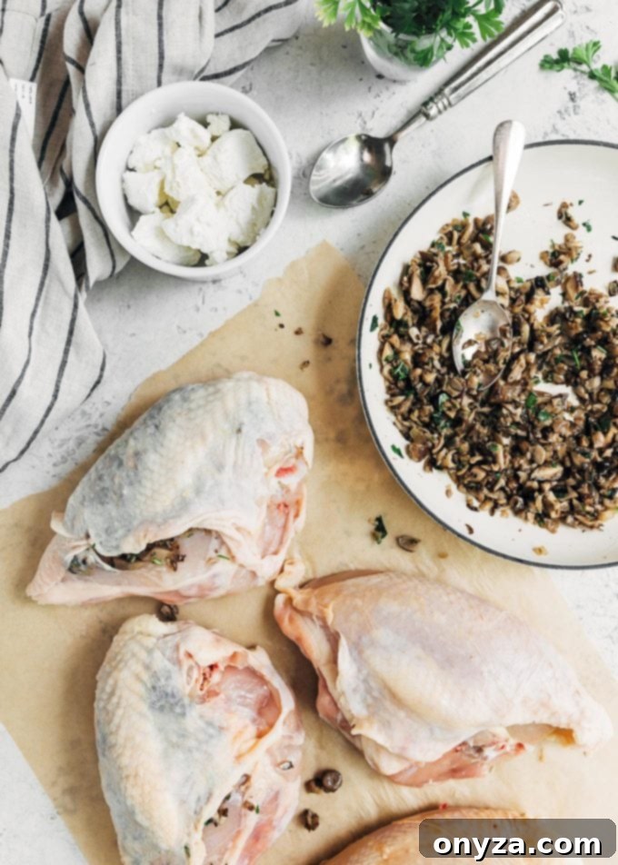 Preparing bone-in chicken breasts for stuffing with a savory mushroom and goat cheese mixture