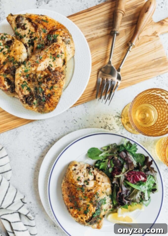 Elegantly served stuffed chicken breasts with mushrooms and goat cheese on a platter and individual plates