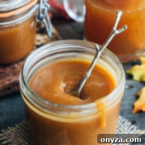 Rich homemade apple cider caramel, perfect for fall desserts and dipping apples.