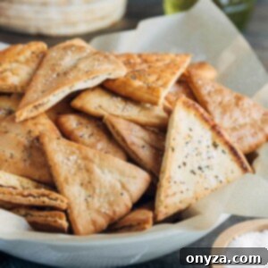 baked homemade pita chips in a serving bowl