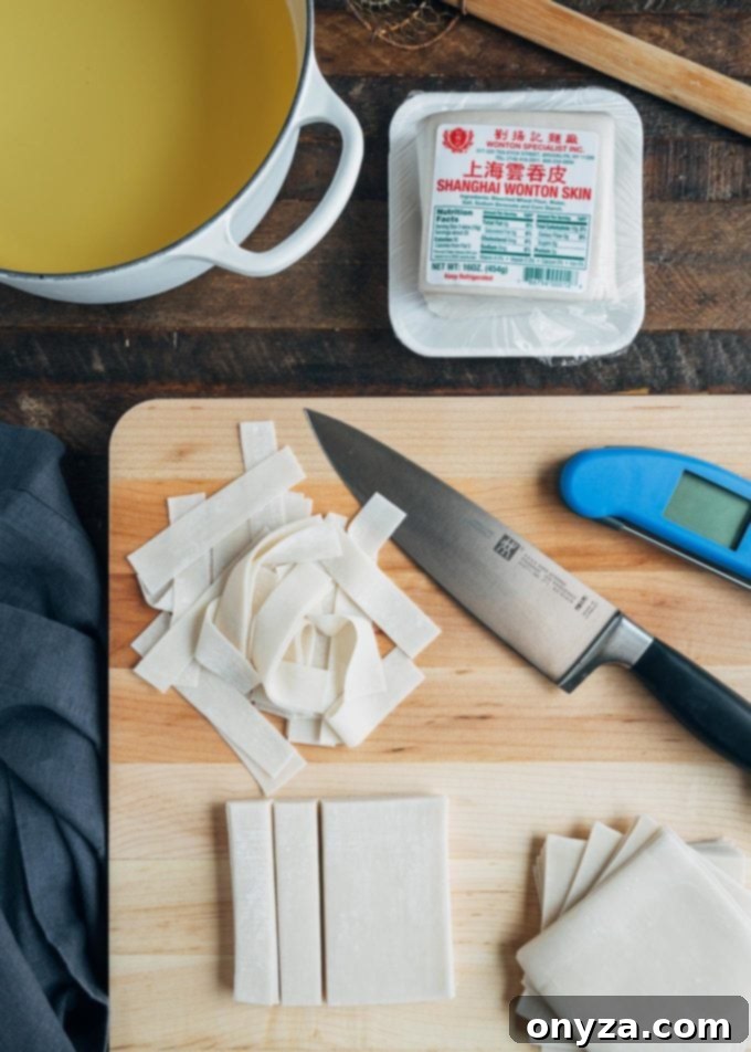 Crispy Fried Wonton Strips 3 cut and whole wonton wrappers on a cutting board with a knife
