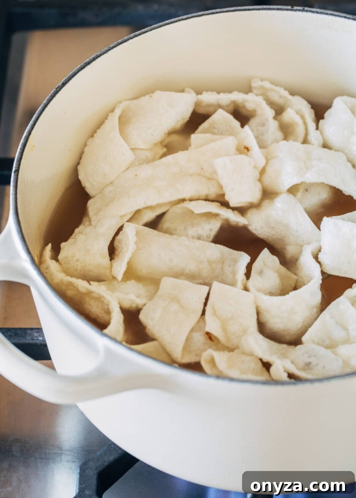 Crispy Fried Wonton Strips 4 wonton strips puffed in hot oil