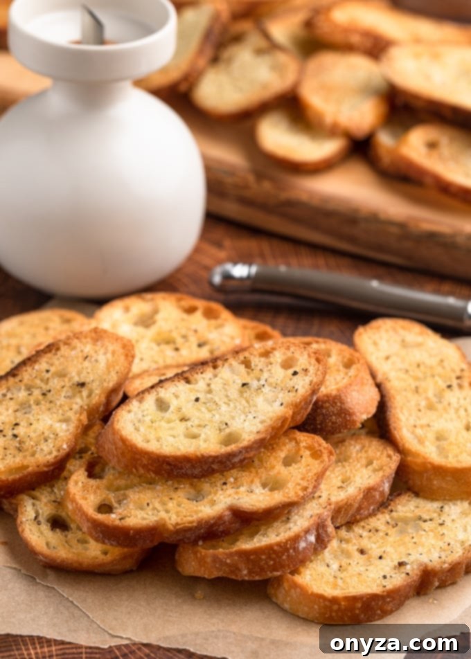 baked crostini toasts on parchment paper