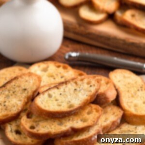 baked crostini toasts on parchment paper