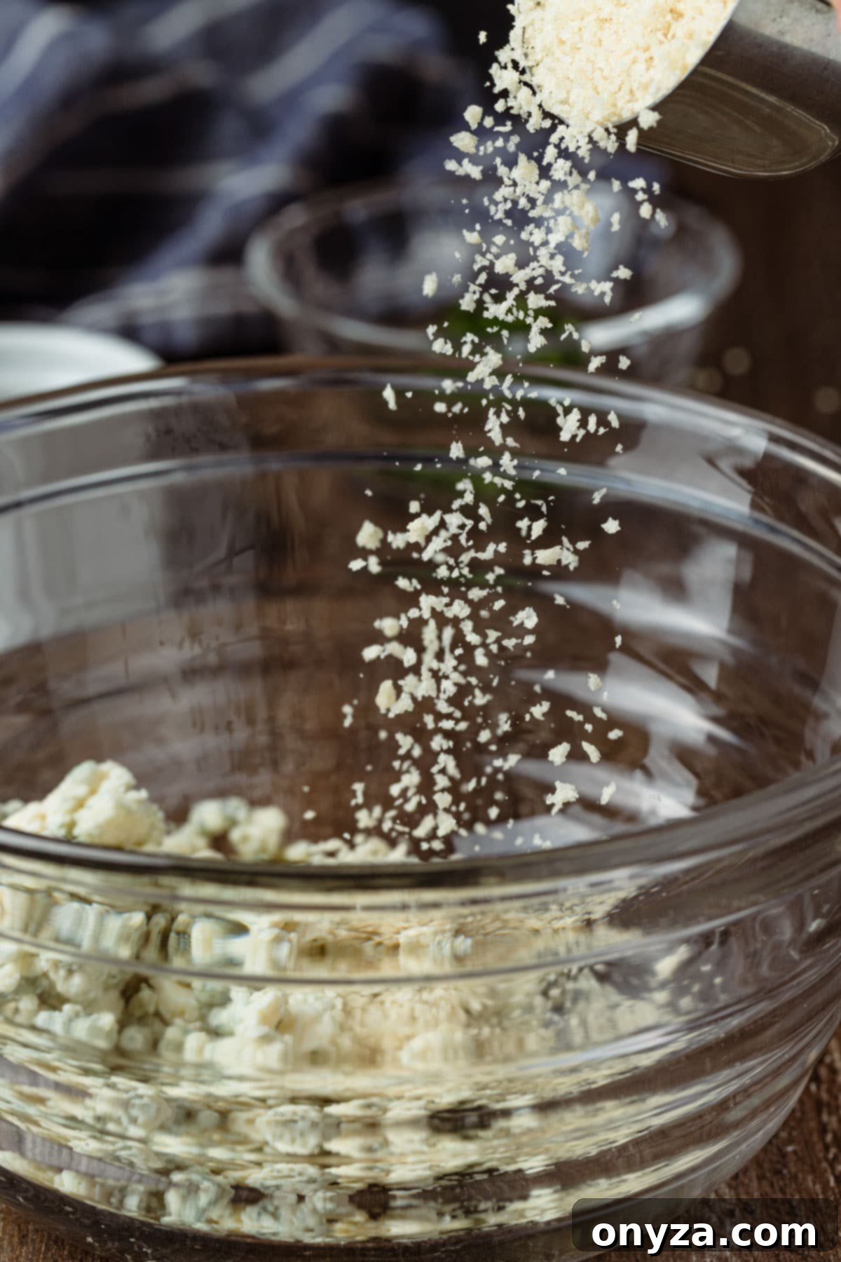 Balsamic Shallot Steak with Blue Cheese Crust 6 pouring panko breadcrumbs into a mixing bowl