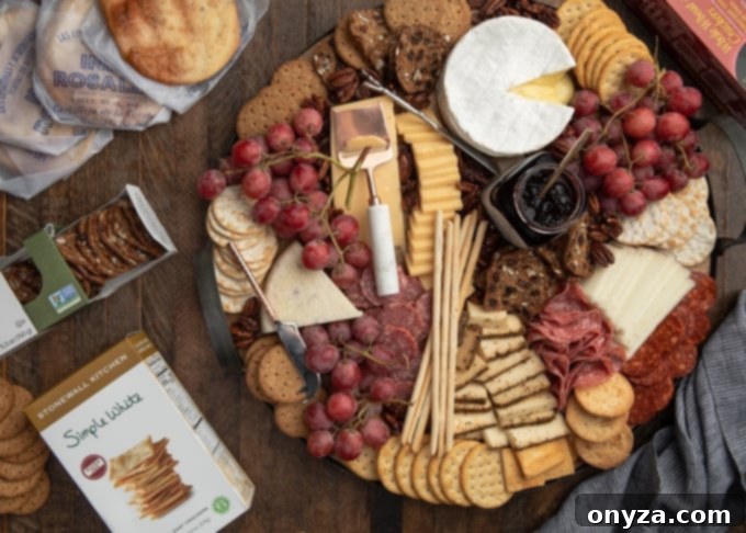 15 Perfect Crackers for Your Cheese Board 3 An array of high-quality artisan cracker boxes displayed next to an assembled cheese board, showcasing the variety available for gourmet pairings.