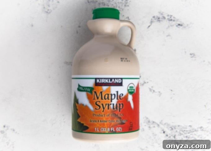 My Top 10 Costco Grocery Staples 5 Large jug of Kirkland Signature organic maple syrup, a top Costco buy