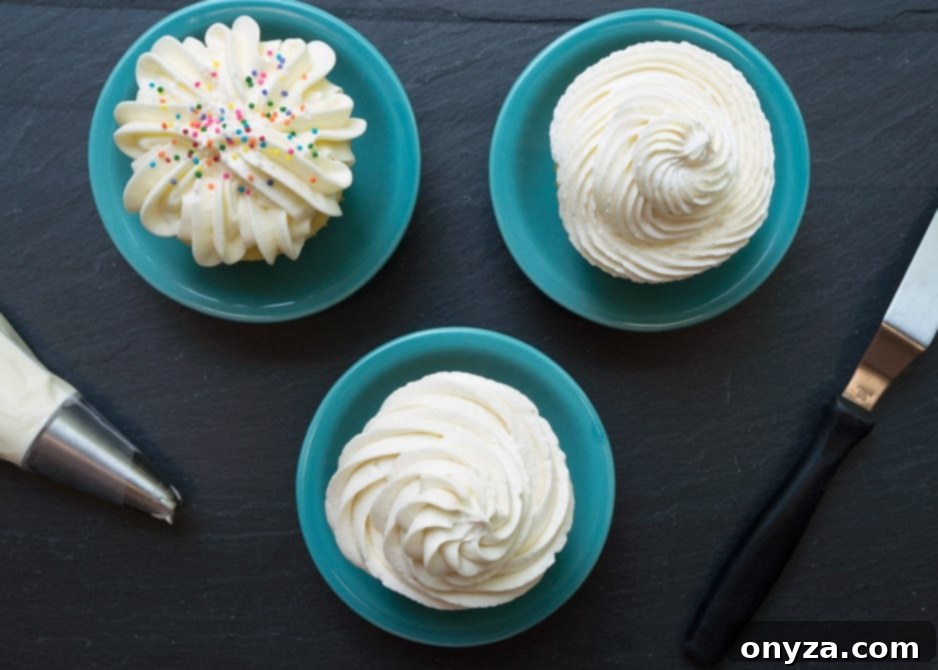 overhead of 3 cupcakes with 3 different types of vanilla frosting