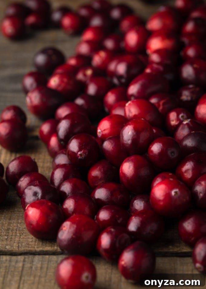fresh cranberries on a wood board