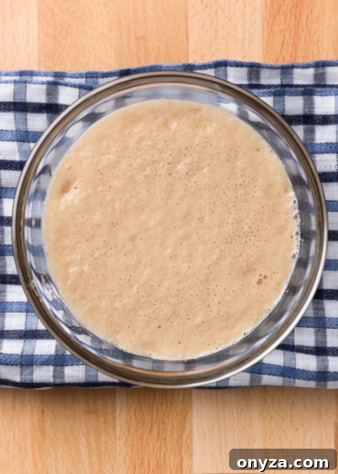 proofed active dry yeast in a bowl with honey and water