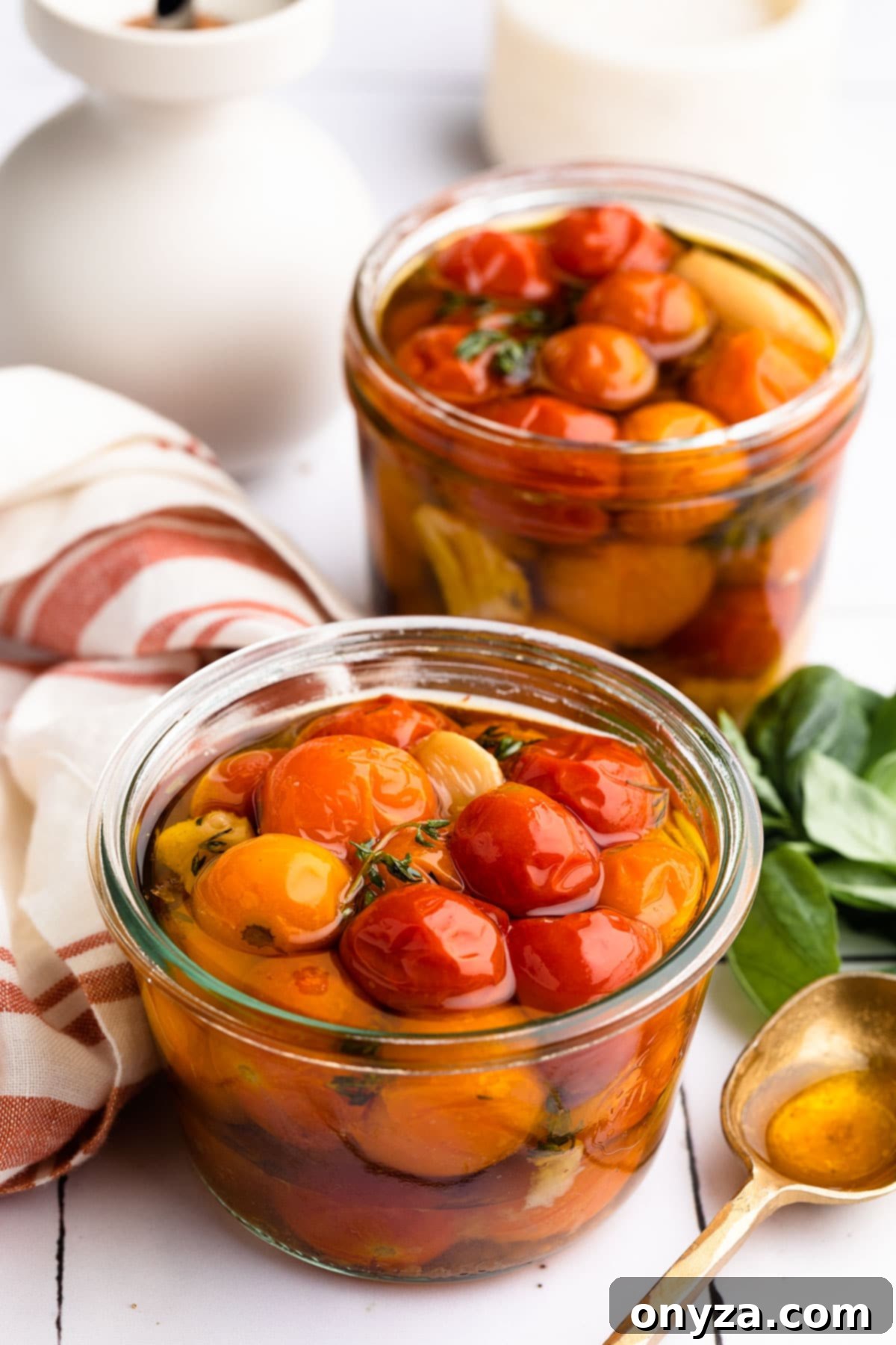 Garlic Herb Cherry Tomato Confit 2 cherry tomato confit in glass jars