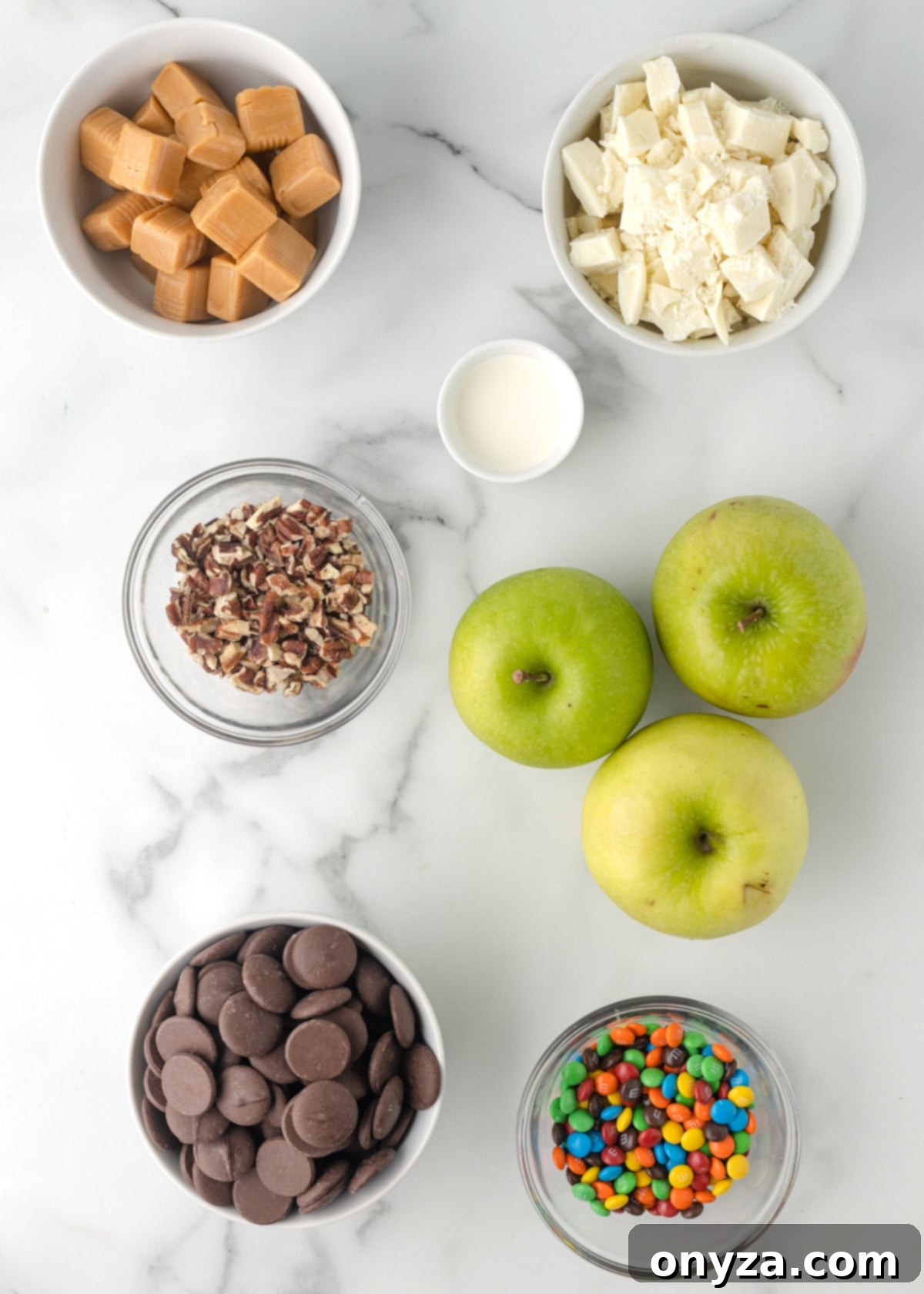 overhead photo showing bowls of ingredients needed to make caramel apple slices