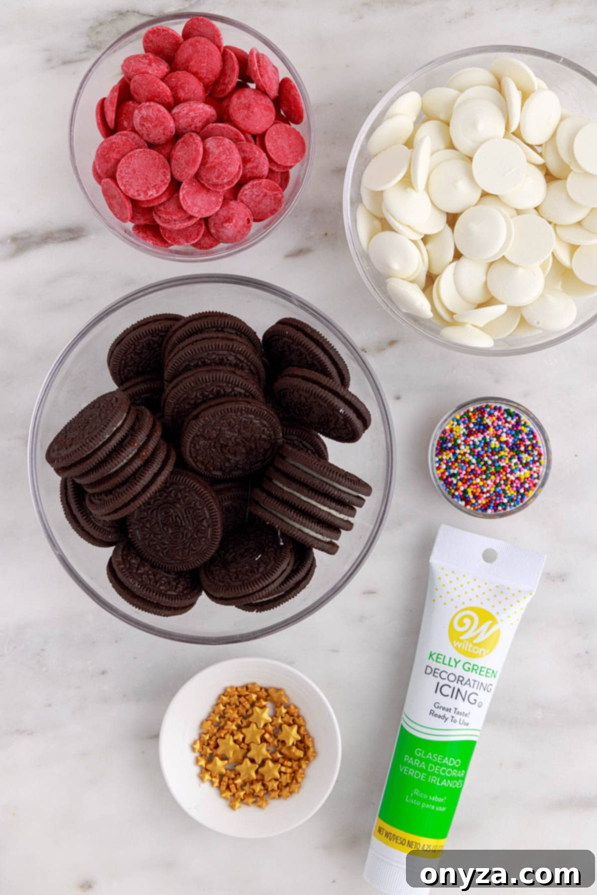 overhead of ingredients needed to make dipped oreo christmas tree cookies