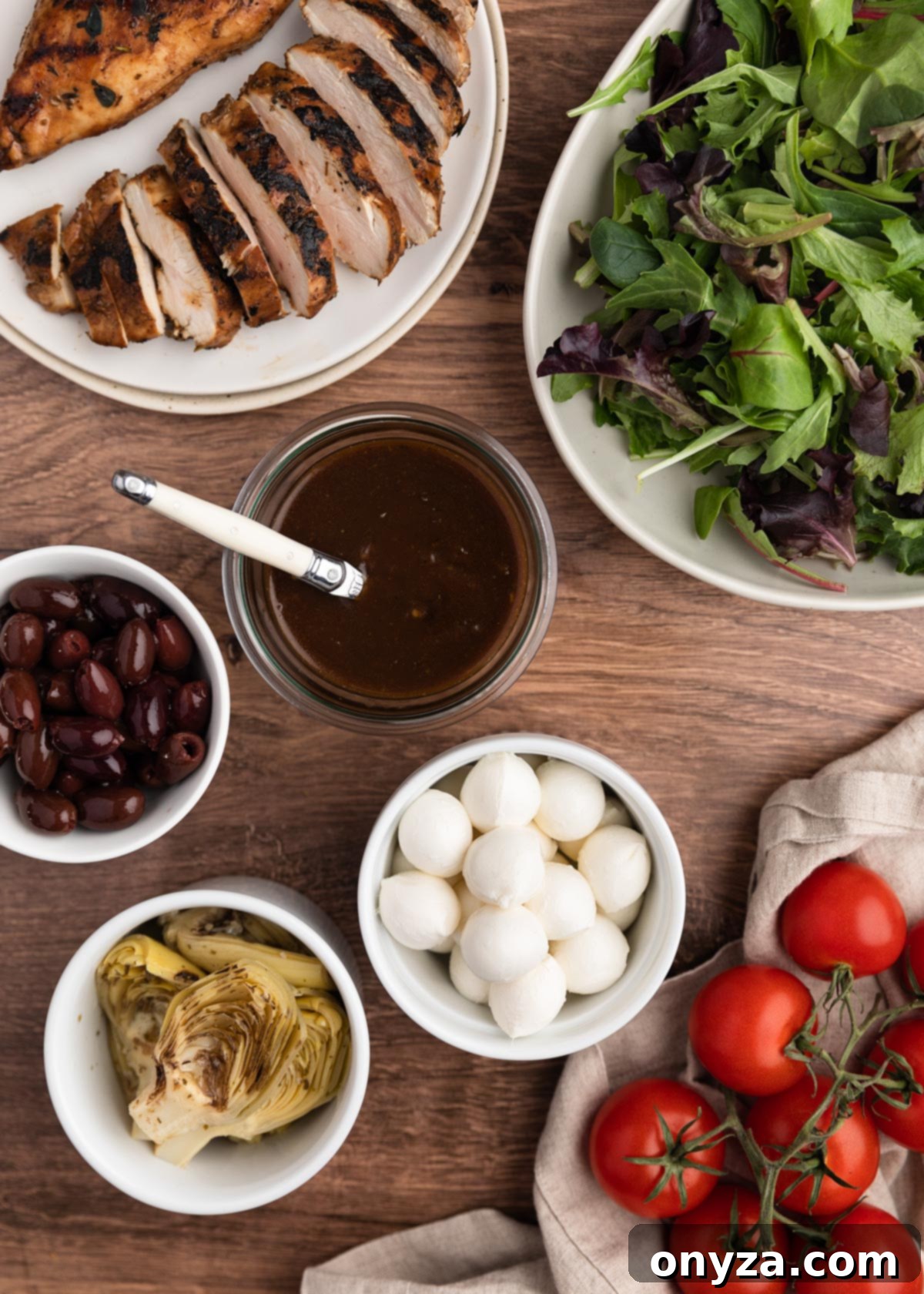 overhead photo of ingredients for balsamic chicken salad in bowls