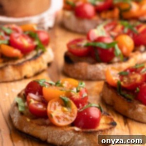 Fresh Cherry Tomato Bruschetta 11 cherry tomato bruschetta on a wood serving board