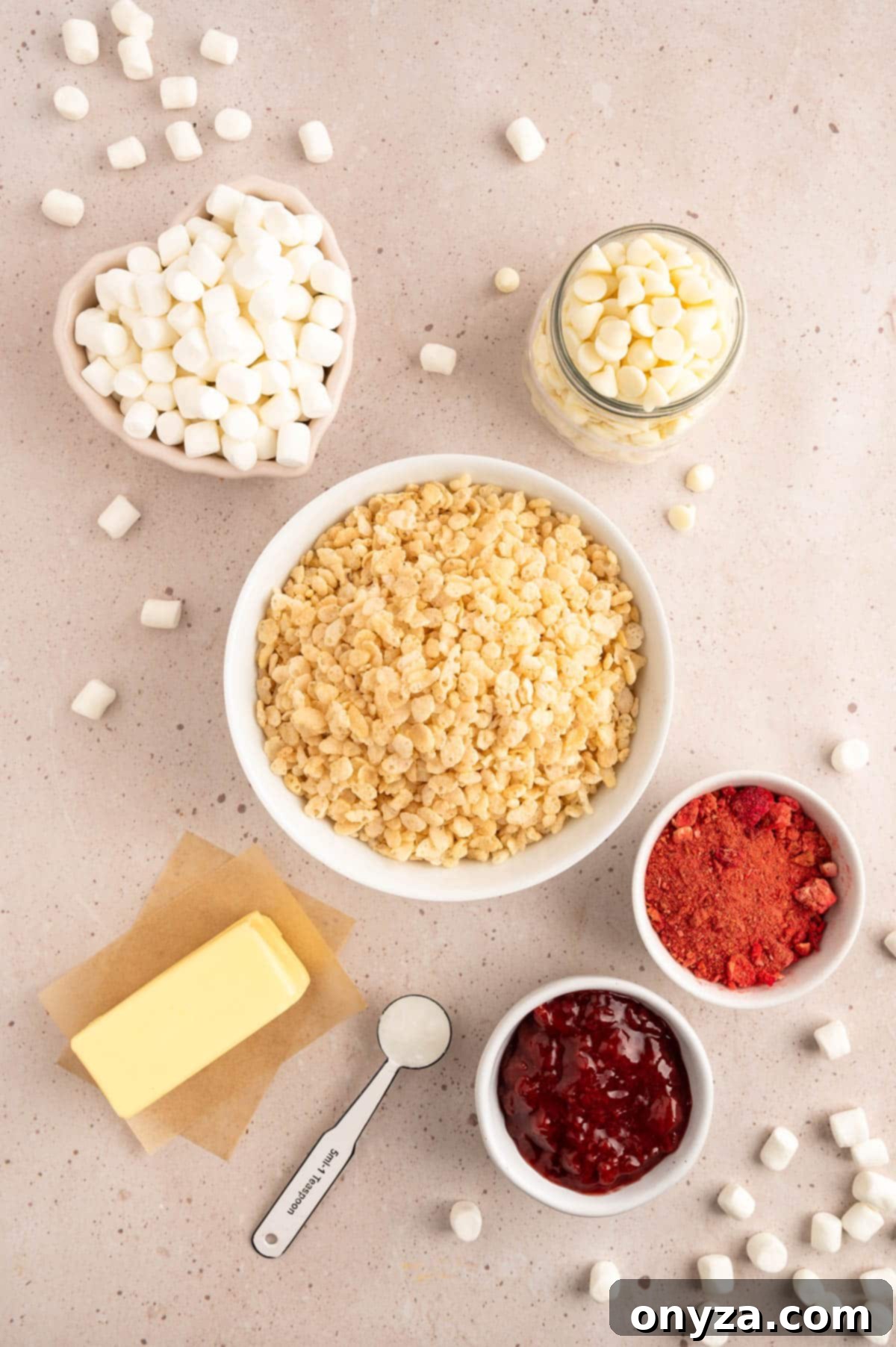 Sweet Strawberry Krispie Delights 3 Overhead shot showcasing a collection of ingredients artfully arranged in bowls, ready for preparing delightful strawberry rice krispie treats