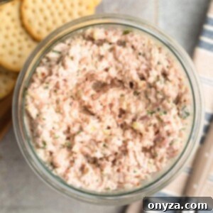 overhead photo of homemade Deviled Ham spread in a glass jar