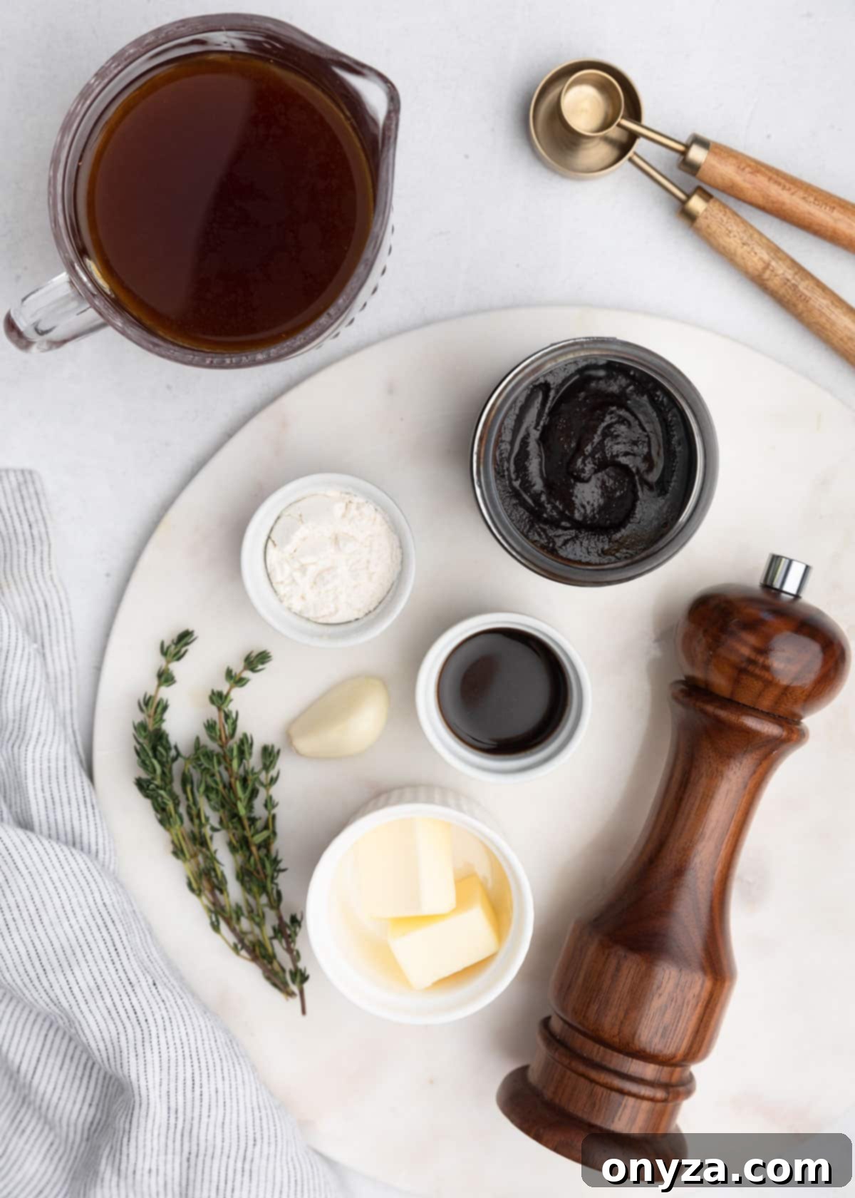 Savory French Dip Sliders 4 overhead photos of the ingredients needed to make beef jus on a marble board