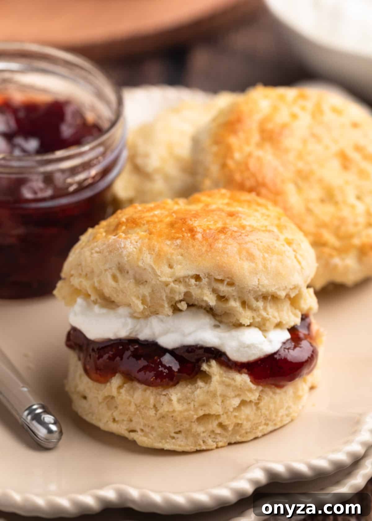 Irish scone sandwiched with strawberry jam and whipped cream