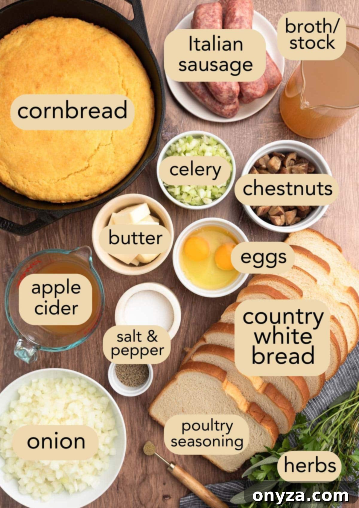 Festive Sausage and Chestnut Stuffing 3 overhead of ingredients for sausage and chestnut stuffing in bowls on a wood board with text labels