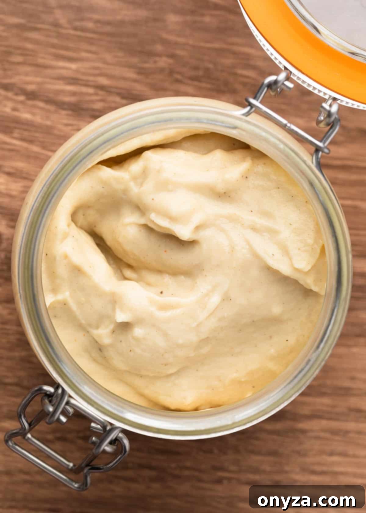 overhead closeup of a refrigerated jar of homemade condensed cream of chicken soup