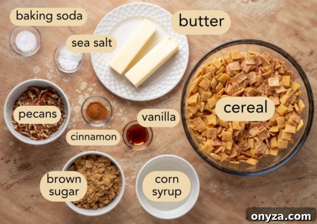 An overhead view showcasing all the essential ingredients meticulously laid out in individual bowls, including Cinnamon Toast Crunch, Corn Chex, whole pecans, butter, brown sugar, corn syrup, vanilla, cinnamon, and baking soda, clearly labeled for making cinnamon praline crunch snack mix.