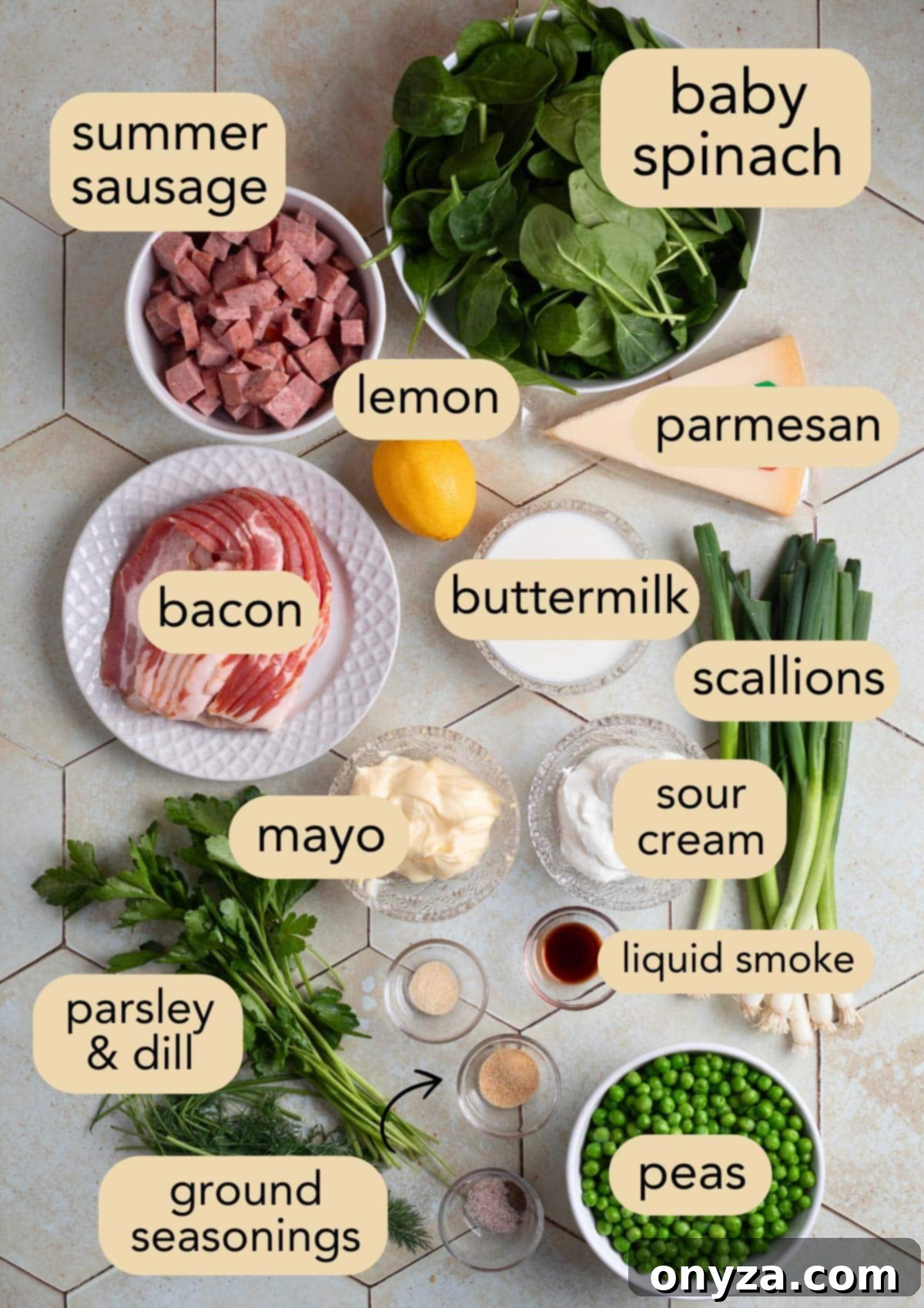 Savory Spinach & Pea Salad with Crispy Bacon and Sausage 3 Overhead shot of all ingredients needed for spinach pea salad laid out in bowls on an ivory tile surface.