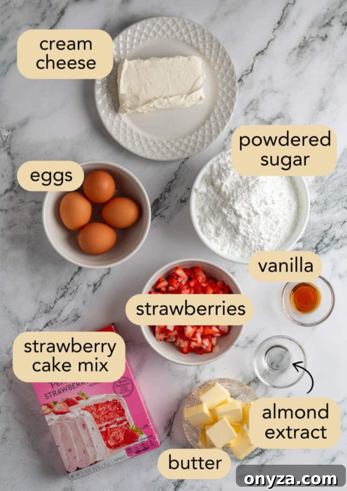 Overhead shot of all the ingredients needed to make strawberry chess bars, neatly arranged in bowls on a white marble surface, ready for preparation.