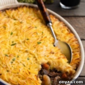 Stout-Braised Short Rib Cottage Pie in an oval gratin dish