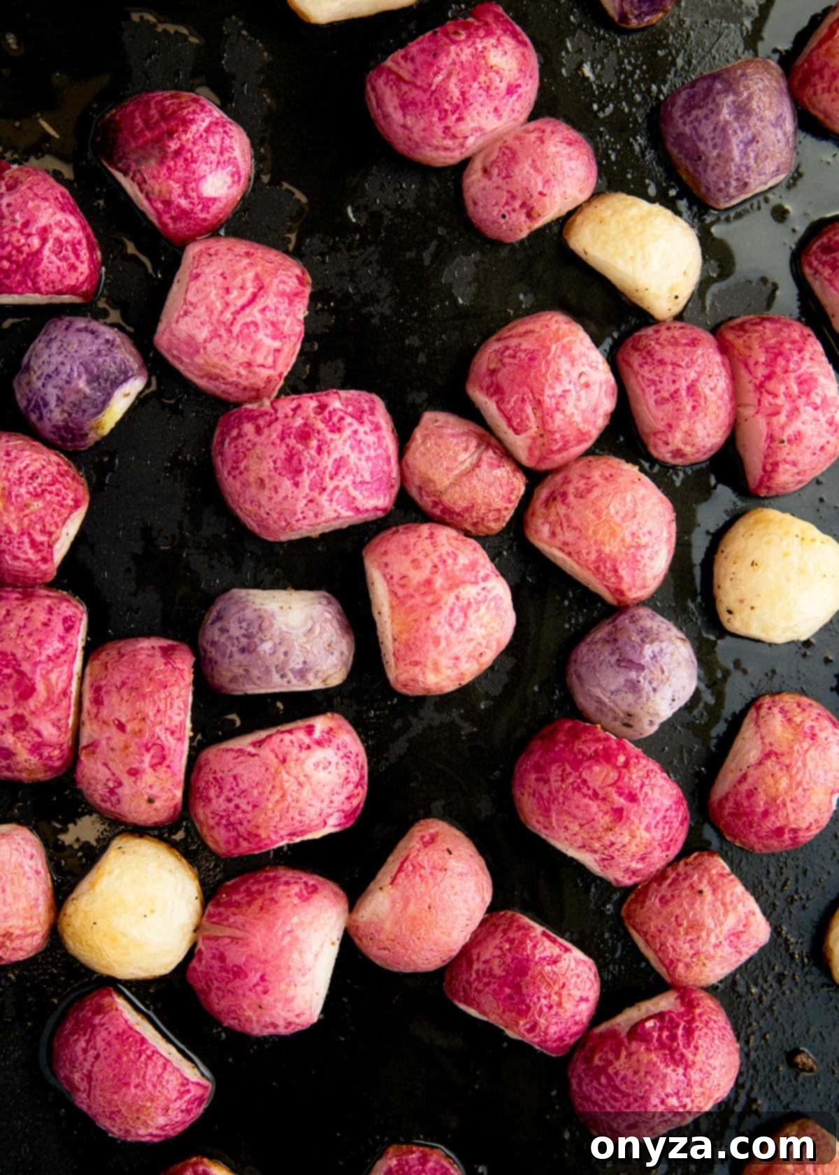 roasted radishes on a baking sheet