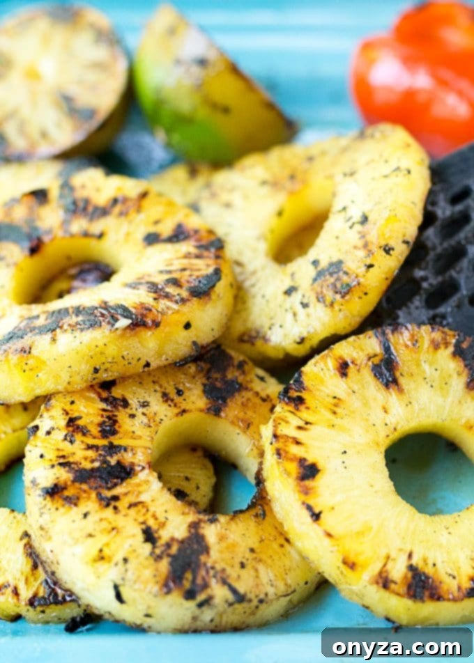 Sweet & Smoky Grilled Pineapple Salsa 4 Perfectly grilled pineapple slices artfully arranged on a serving platter