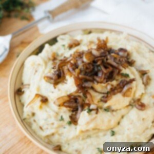 Caramelized Shallot and Cheddar Mashed Potatoes, a rich and creamy side dish perfect for holiday meals.