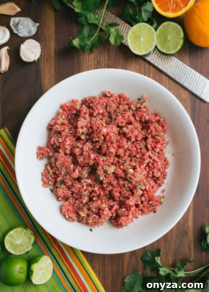 Mixing Ground Beef with Mojo Sauce Panade