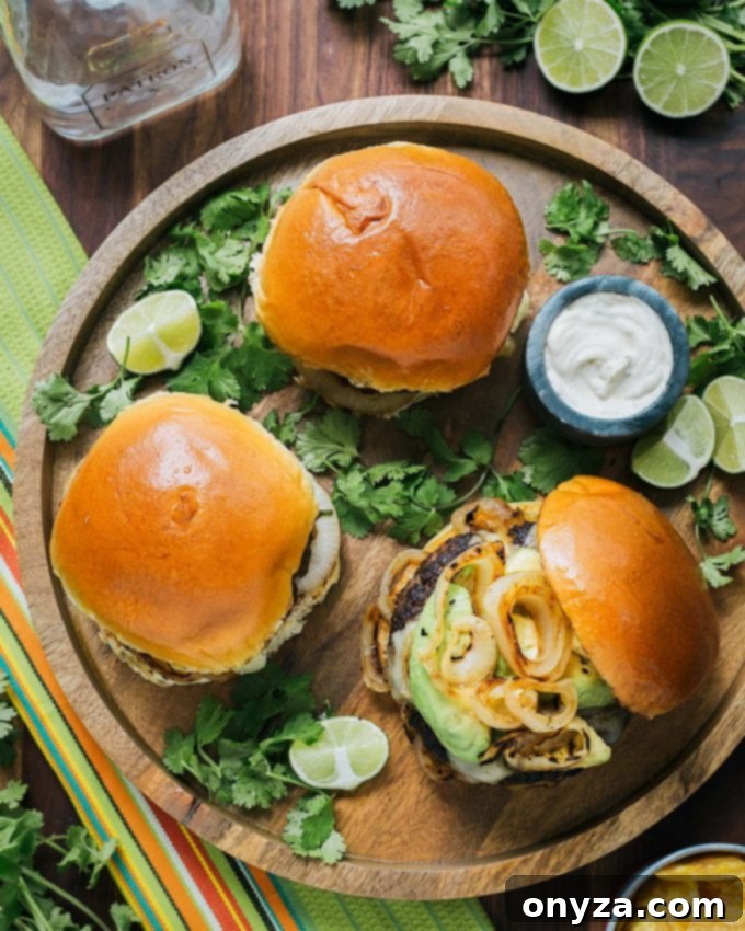 Mojo Beef Burgers on a Serving Tray with Tequila-Lime Aioli