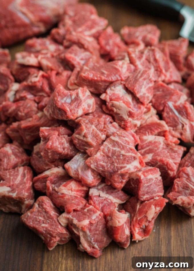 Chilled Chuck Beef Cubes | Striped Spatula Beef chuck cut into uniform cubes, meticulously prepared and chilled for optimal grinding results.