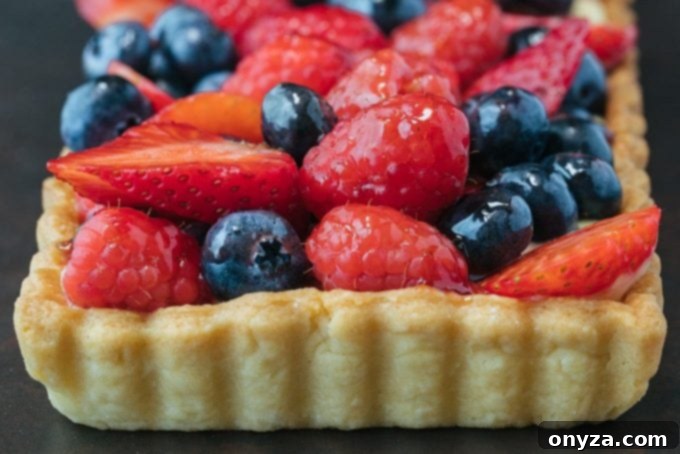Finished Lemon Cream Mixed Berry Tart ready to be served