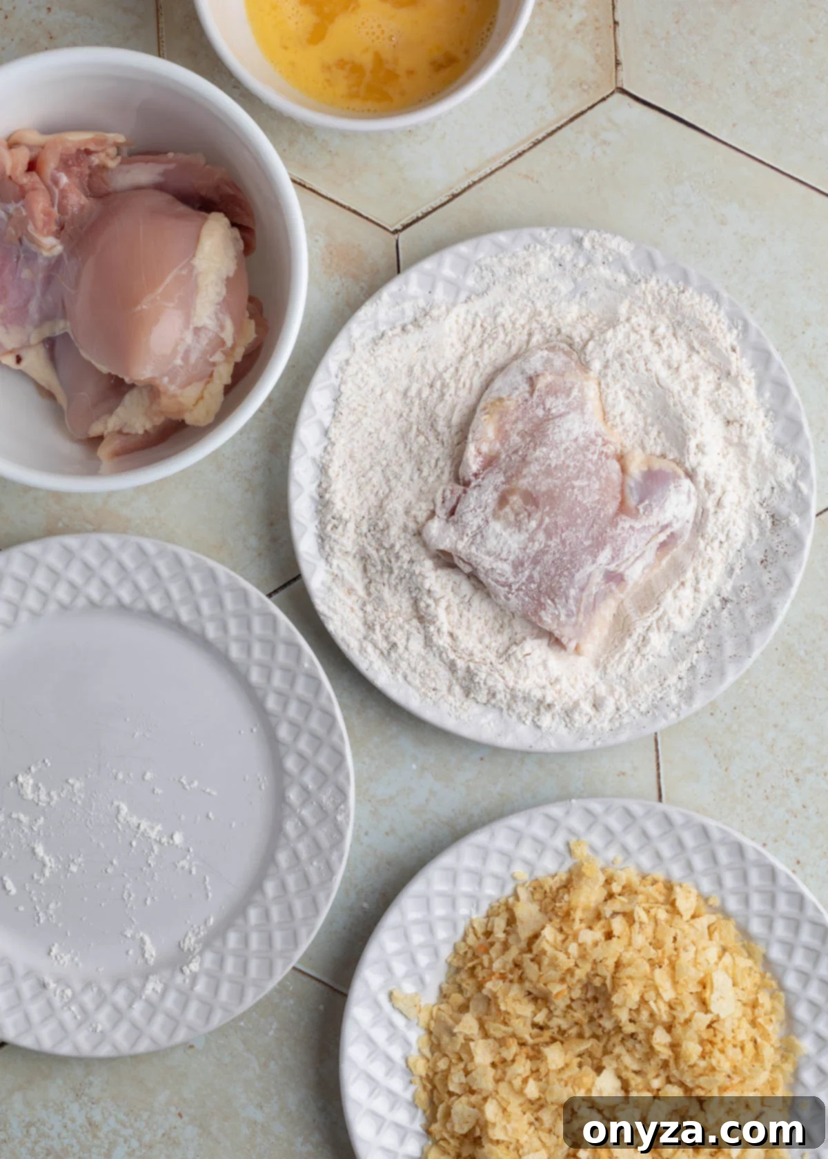 Dredging the chicken thighs