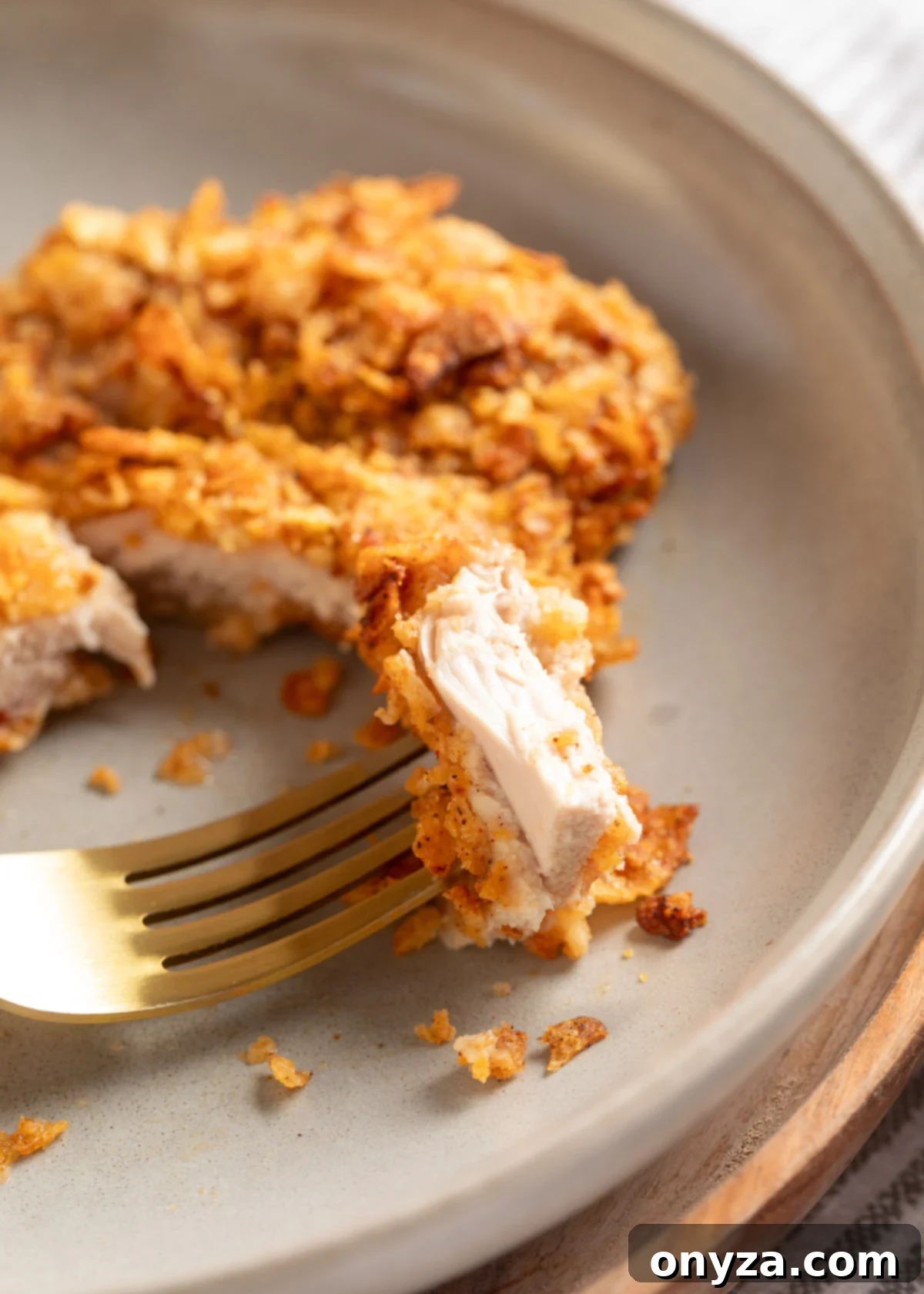 Close-up of Potato Chip Chicken showing the crispy coating and tender chicken.